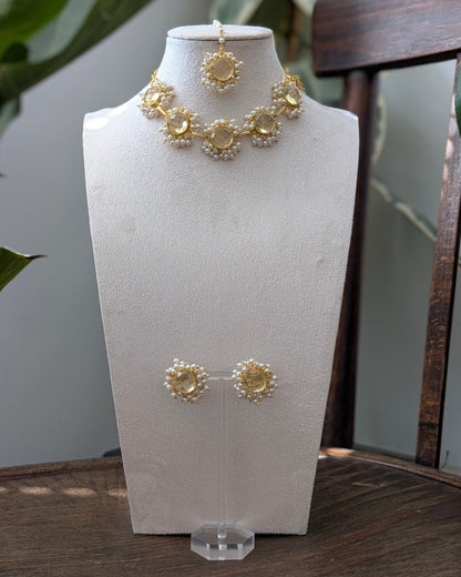 Yellow jewellery set with necklace tikka and earrings 